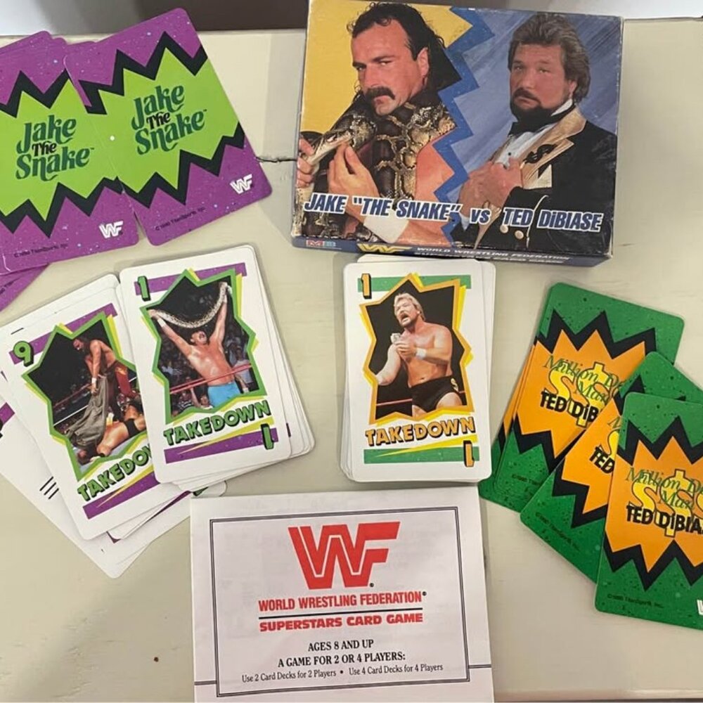 Vintage 1990 Milton Bradley - “Jake the Snake “vs. Ted Dibiase WWF Card Game